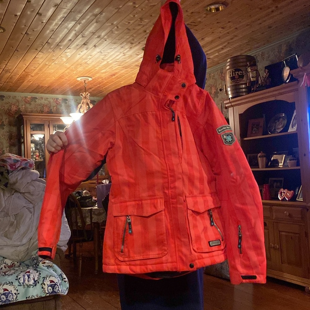 Used red ski jacket small